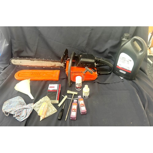 351 - Petrol chainsaw and accessories in working order