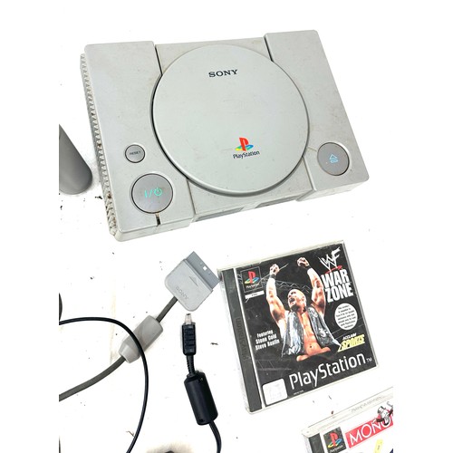 95 - Playstation One with controllers and 7 games, untested, to include Star Wars, Monopoly, War zone etc... 