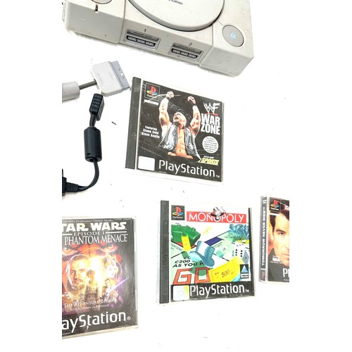 95 - Playstation One with controllers and 7 games, untested, to include Star Wars, Monopoly, War zone etc... 