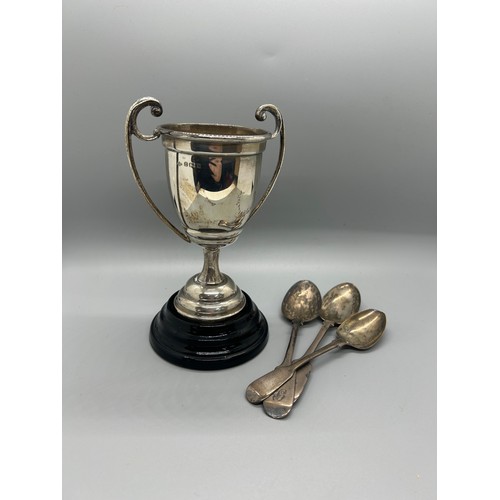 546 - Hallmarked silver trophy with wooden base, 3 silver tea spoons, approximate total silver weight 175g