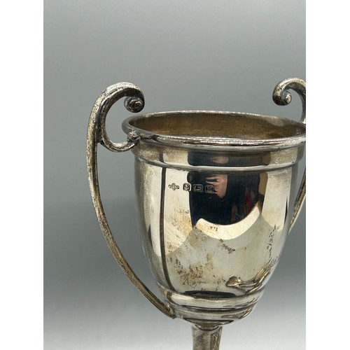 546 - Hallmarked silver trophy with wooden base, 3 silver tea spoons, approximate total silver weight 175g