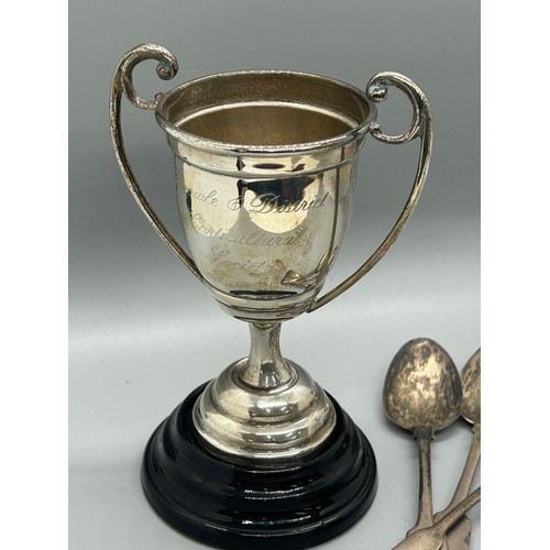 546 - Hallmarked silver trophy with wooden base, 3 silver tea spoons, approximate total silver weight 175g