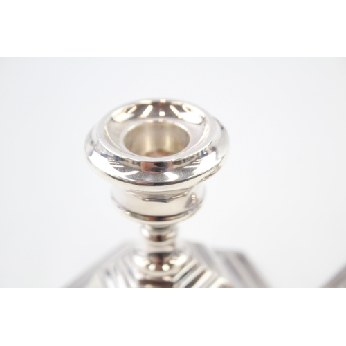 46 - 2 x .925 sterling weighted candlesticks