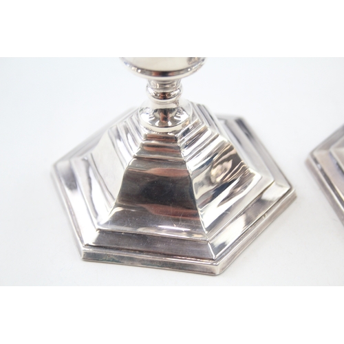 46 - 2 x .925 sterling weighted candlesticks