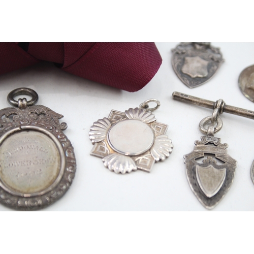 59 - 7 x .925 sterling silver fobs / medallions