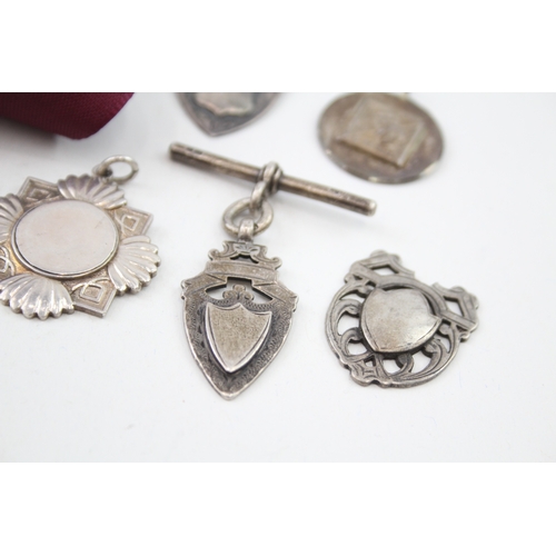 59 - 7 x .925 sterling silver fobs / medallions