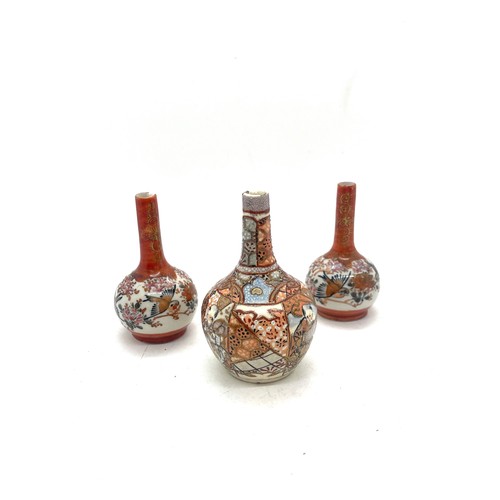 302 - Three Oriental miniature satsuma vases, tallest measures approximately 4 inches, chip to top of one ... 