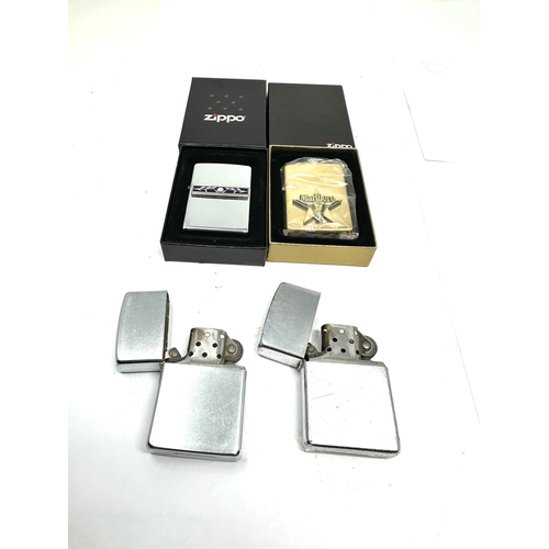 476 - 4 zippo lighter 2 unused boxed