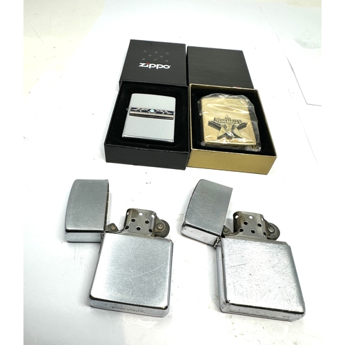 476 - 4 zippo lighter 2 unused boxed