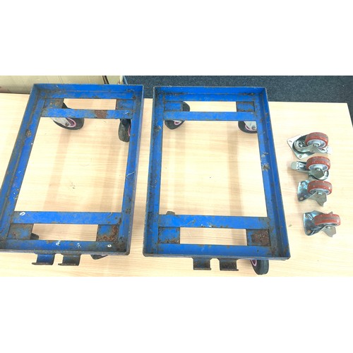 343 - Two industrial trolleys with a set of spare casters 25 inches long, 17 wide and 8 tall