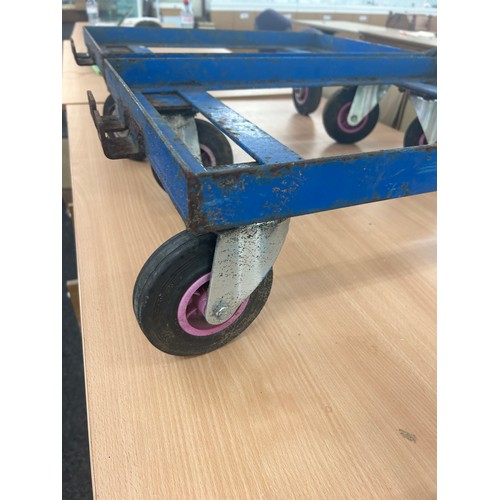 343 - Two industrial trolleys with a set of spare casters 25 inches long, 17 wide and 8 tall