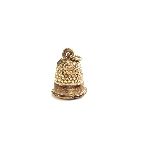 529 - 9ct gold bell charm 0.4 grams