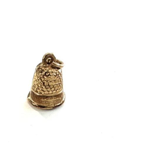 529 - 9ct gold bell charm 0.4 grams