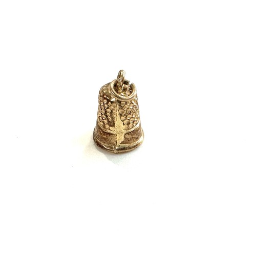 529 - 9ct gold bell charm 0.4 grams