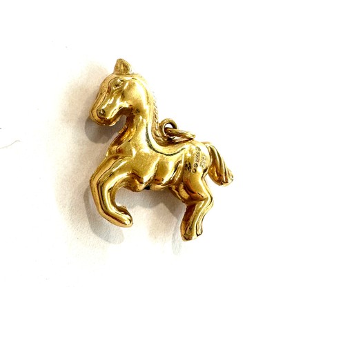 525 - 9ct gold horse pendant 2.1 grams