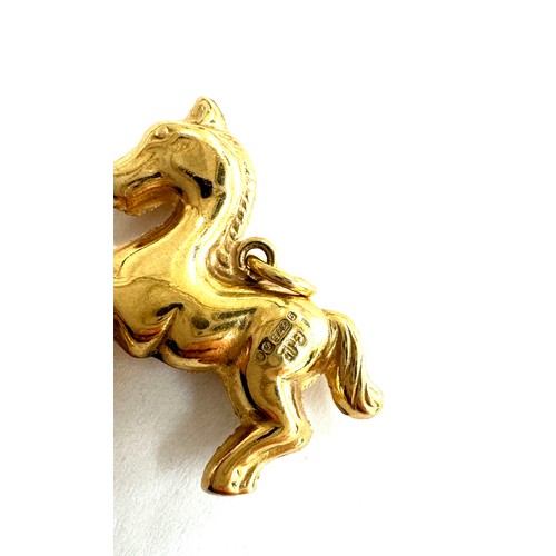 525 - 9ct gold horse pendant 2.1 grams