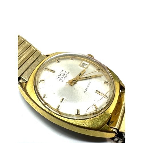 449 - Vintage Gents Avia Olympic wristwatch.the watch is ticking