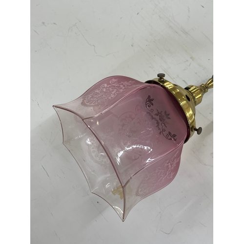 310 - Antique glass shade on a later light fitting