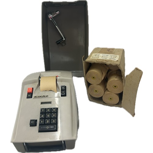 46 - Vintage Decimo adding machine with cover, handle and spare paper reels