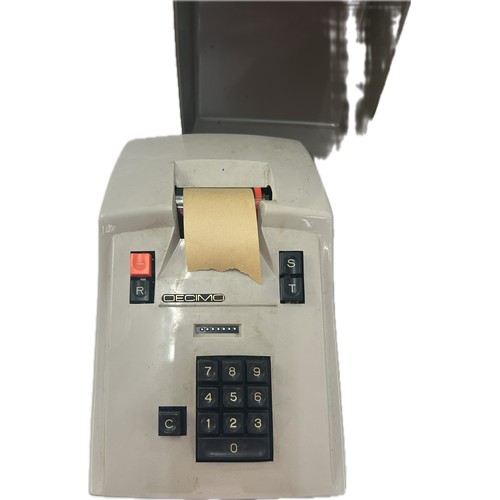 46 - Vintage Decimo adding machine with cover, handle and spare paper reels