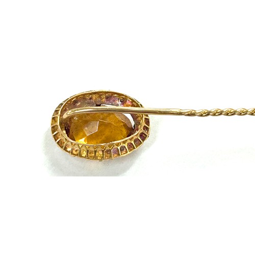 394 - 18ct gold Citrine and seed pearl stick pin with vintage box, overall weight 3.3g