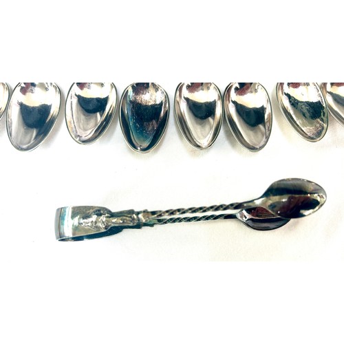 378 - 800 grade silver apostle teaspoons and sugar tongs, total weight 142g