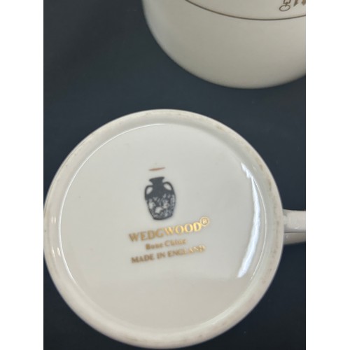 107 - Boxed vintage Wedgwood House of commons, coffee pot, cups and saucers, creamer and sugar box all wit... 