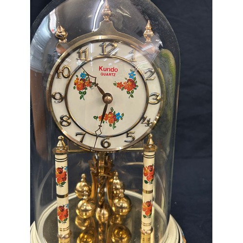 51 - Kundo carriage clock and globe, approximate height of globe 24 inches