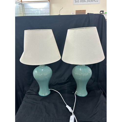 144 - 2 pairs of pot table lamps, tallest measures approximately 23 inches