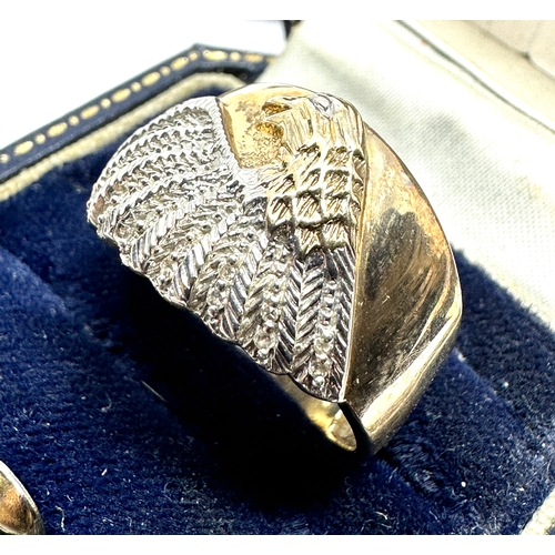 110 - 9ct gold diamond winged eagle ring weight 4.8g