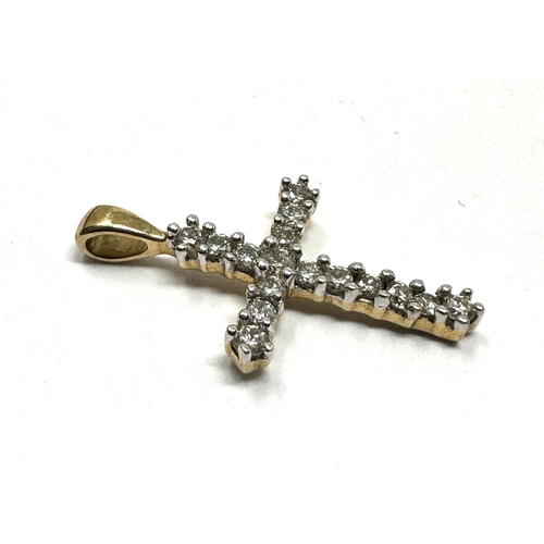 111 - 14ct gold & diamond cross pendant measures approx 2.1cm drop by 1.2cm