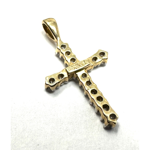 111 - 14ct gold & diamond cross pendant measures approx 2.1cm drop by 1.2cm