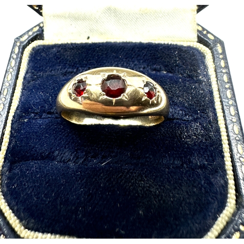 115 - 9ct gold garnet ring weight 3.8g