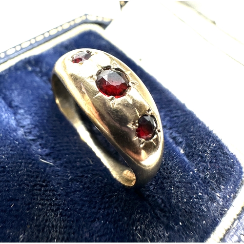 115 - 9ct gold garnet ring weight 3.8g