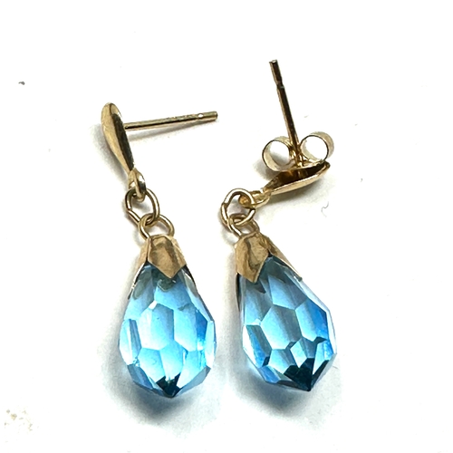 117 - 9ct gold blue faceted stone drop earrings