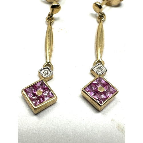 118 - 9ct gold long drop amethyst & diamond earrings measure approx 2.7cm drop