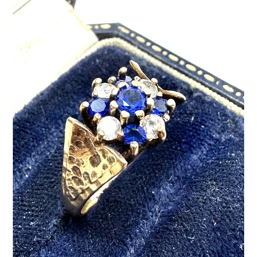 127 - 9ct gold tanzanite & white gemstone ring weight 3.8g