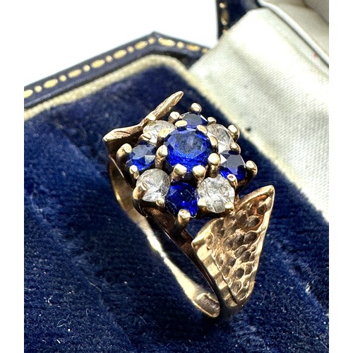 127 - 9ct gold tanzanite & white gemstone ring weight 3.8g