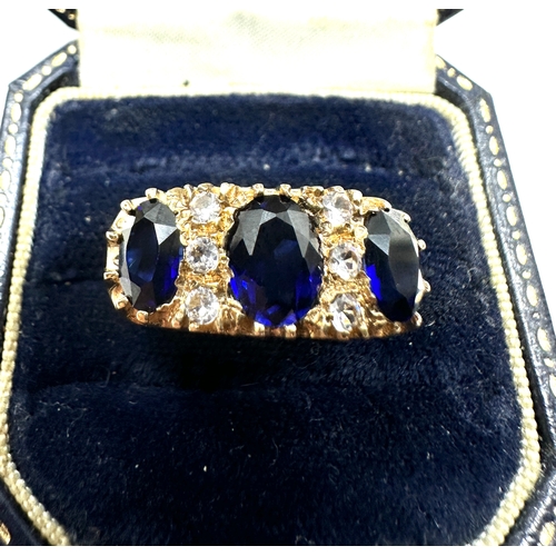 138 - 9ct gold tanzanite & white gemstone ring weight 7.5g