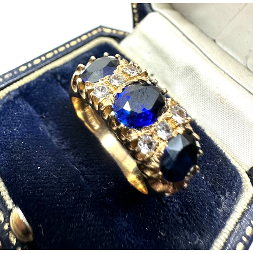 138 - 9ct gold tanzanite & white gemstone ring weight 7.5g