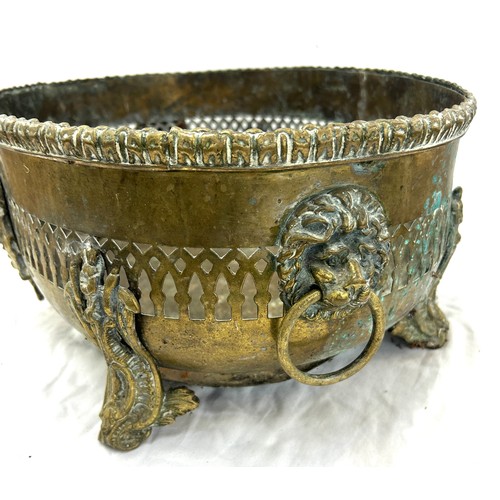 242 - Vintage brass two handled 19th century planter measures approximately 7 inches tall 17 inches wide 1... 