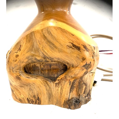 234 - Carved wooden lamp, height approximately 28 inches