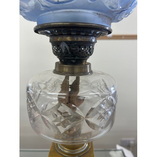 342 - Brass column oil lamp with blue glass shade 30 inches tall