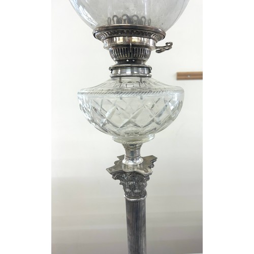 341 - Silver plated collum base oil lamp height 33.5 inches tall