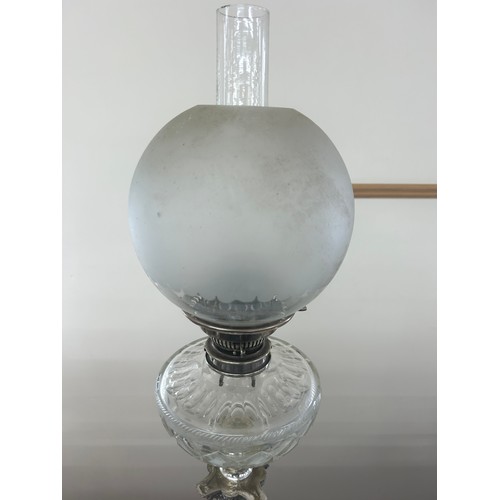 341 - Silver plated collum base oil lamp height 33.5 inches tall