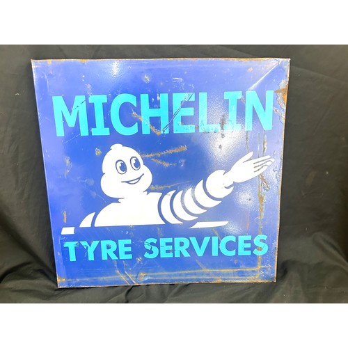 28 - Advertising Michelin man sign measures approximately 16 inches tall 16 inches wide