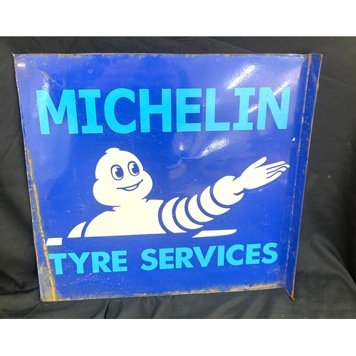 28 - Advertising Michelin man sign measures approximately 16 inches tall 16 inches wide