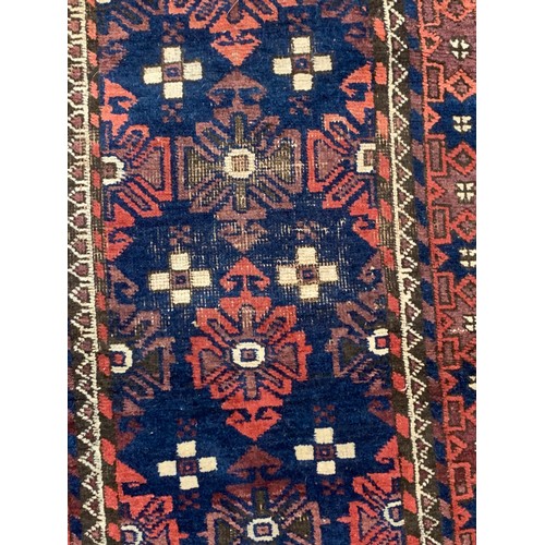 160 - Small rug measures approximately 48 inches long 27 inches wide