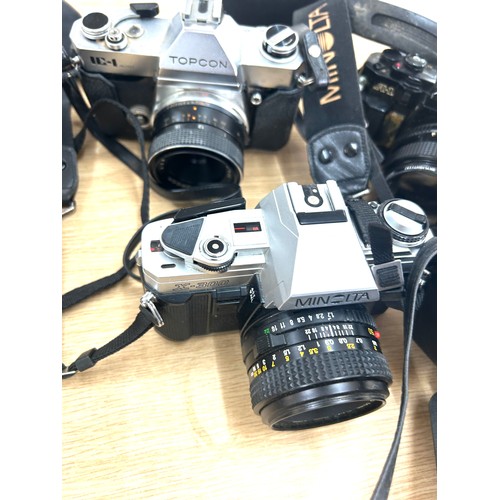 78 - Selection of Vintage cameras includes Topcon, Canon, Nikon etc