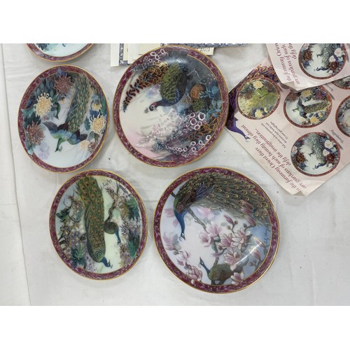 65 - Set of 8 Lily Chung Garden of paradise plates with COA